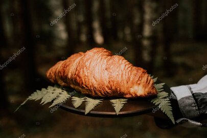 Warm bread rolls in a basket at the campsite shop